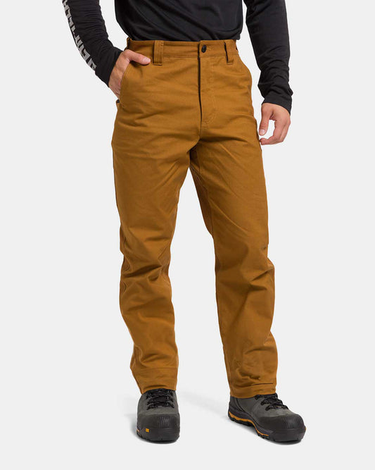 CAT Workwear Men's Brush Pant Bronze on model front, color:Bronze