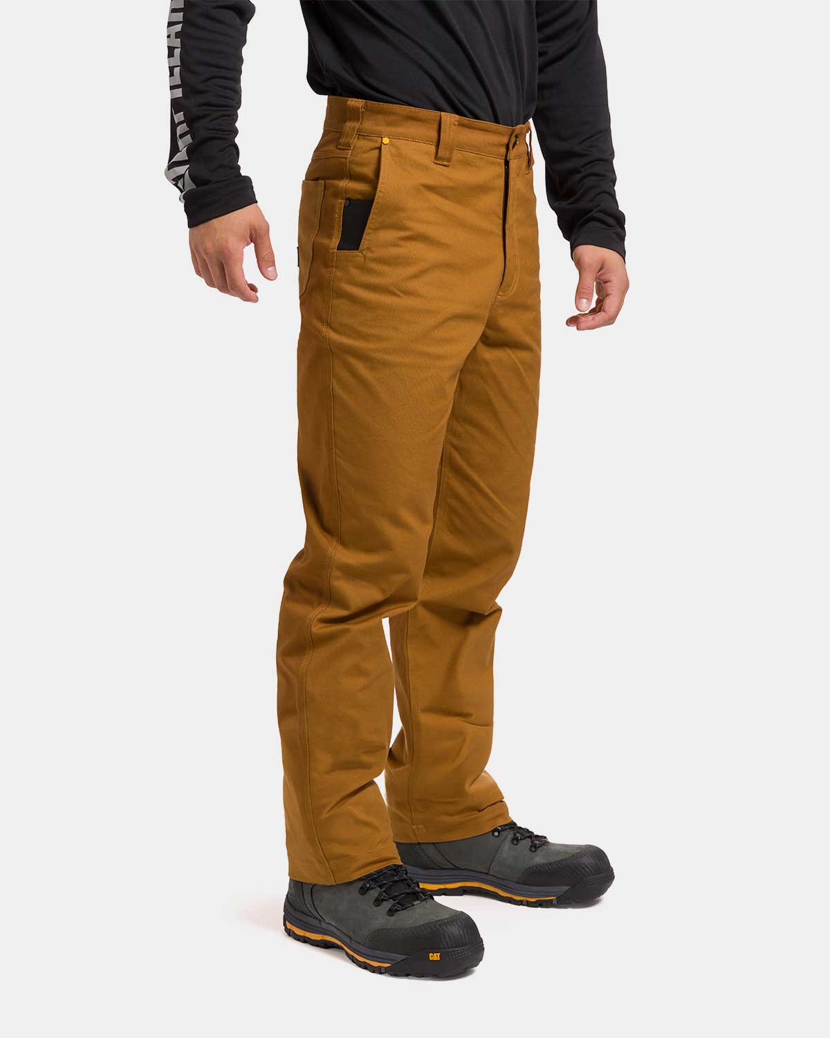 CAT Workwear Men's Brush Pant Bronze on model right side, color:Bronze