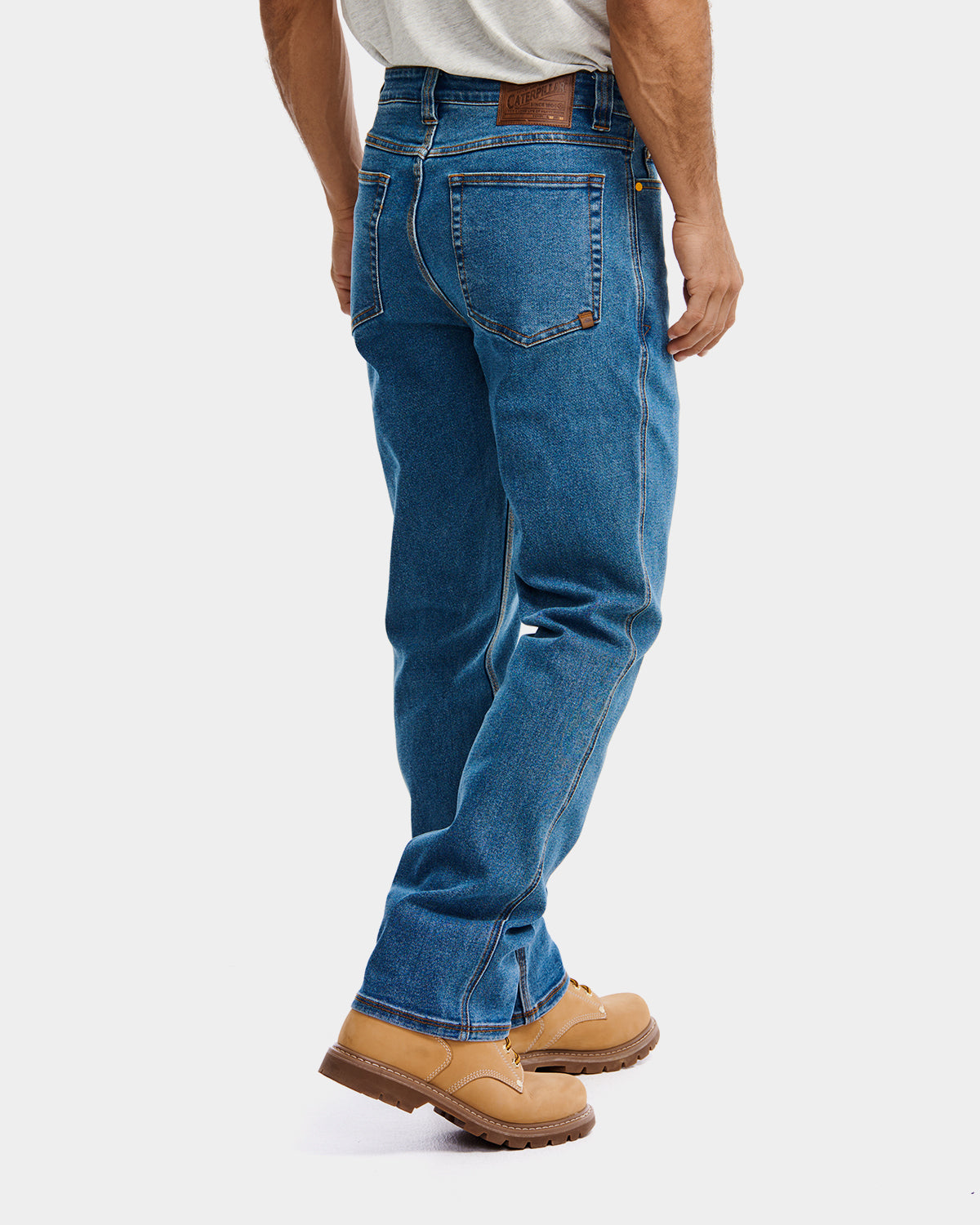 Cat Workwear MEN'S D4 ATHLETIC FIT JEAN Light Stone on model back, color:Light Stone