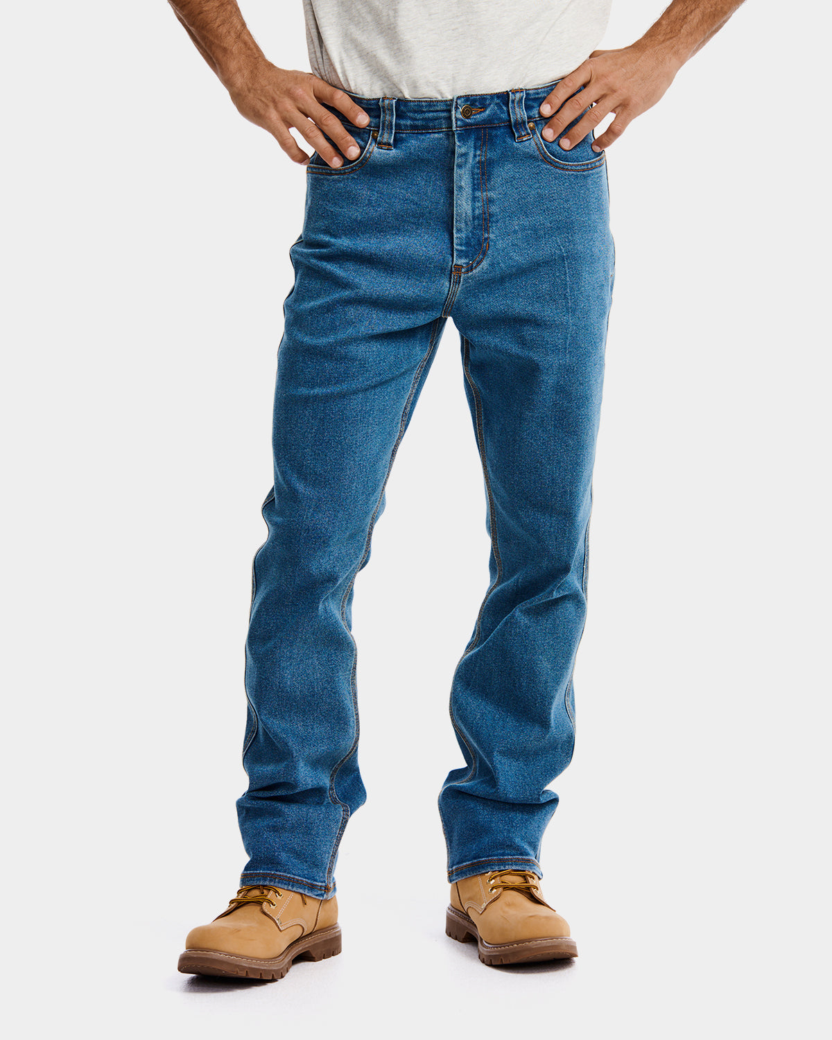 Cat Workwear MEN'S D4 ATHLETIC FIT JEAN Light Stone on model Front, color:Light Stone