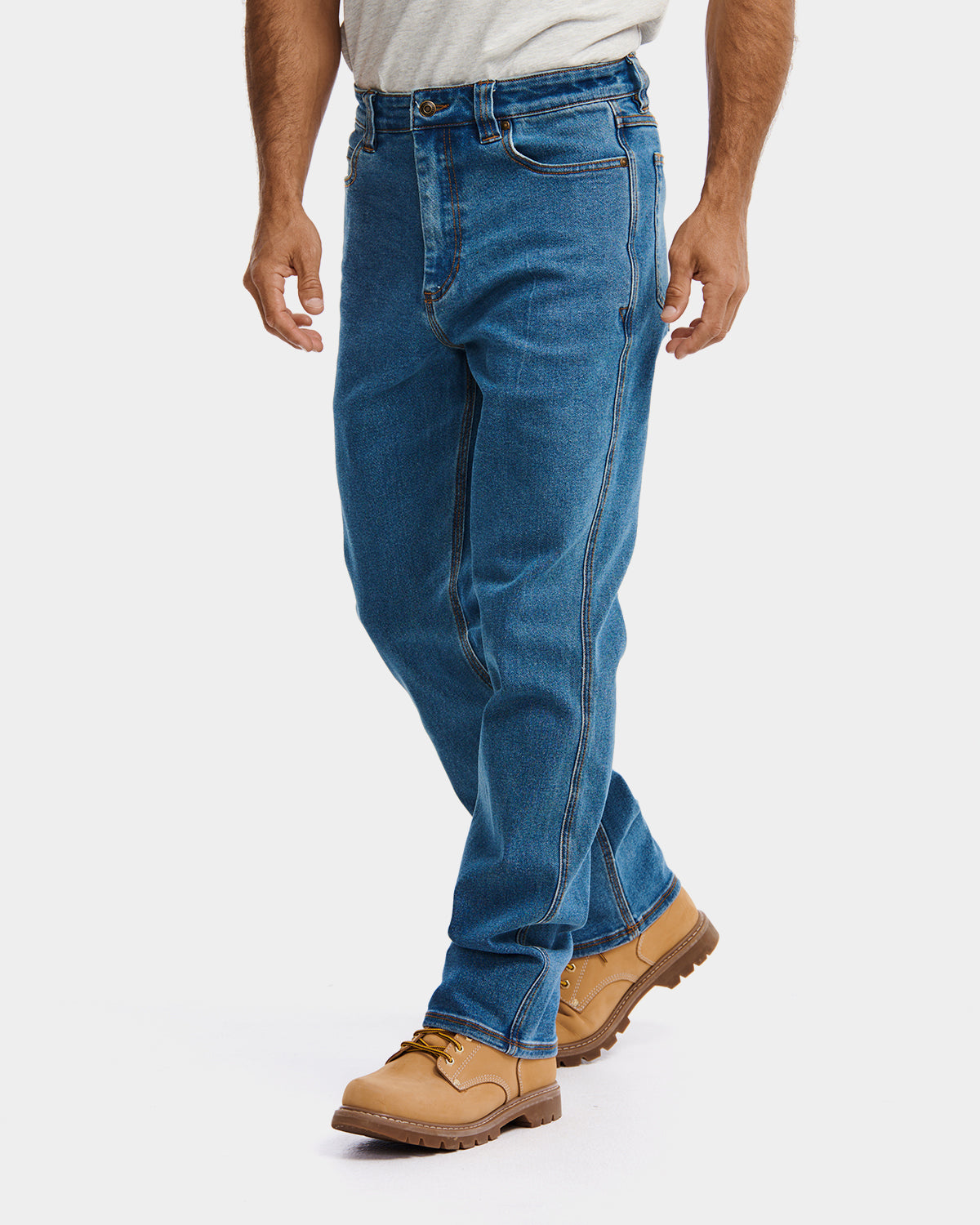 Cat Workwear MEN'S D4 ATHLETIC FIT JEAN Light Stone on model left side, color:Light Stone