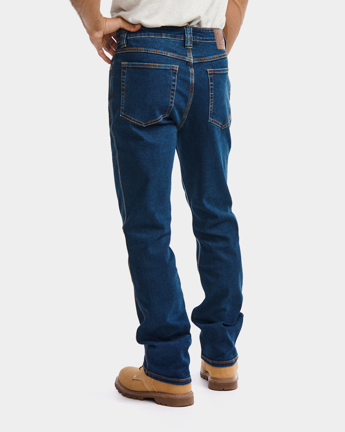 Cat Workwear MEN'S D4 ATHLETIC FIT JEAN Dark Stone on model back, color:Dark Stone