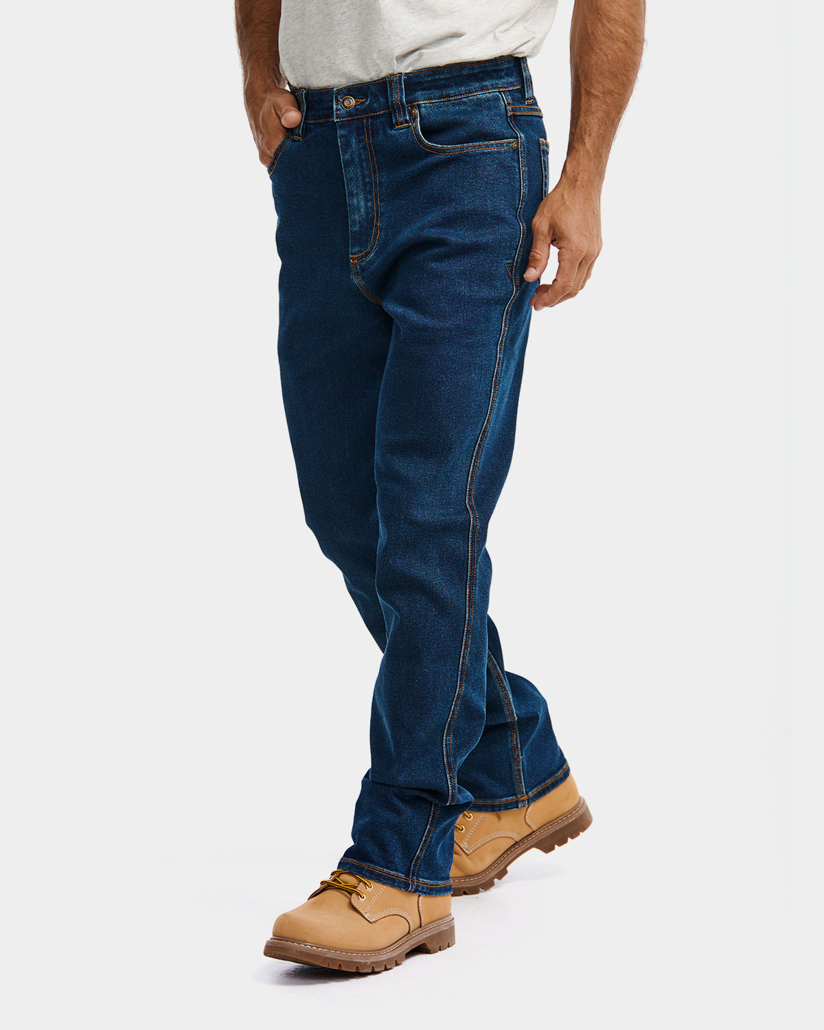 Cat Workwear MEN'S D4 ATHLETIC FIT JEAN Dark Stone on model left side, color:Dark Stone