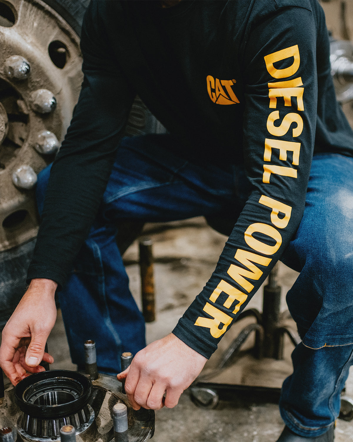 CAT Workwear Men's Diesel Power Long Sleeve T-Shirt Black Working On Truck