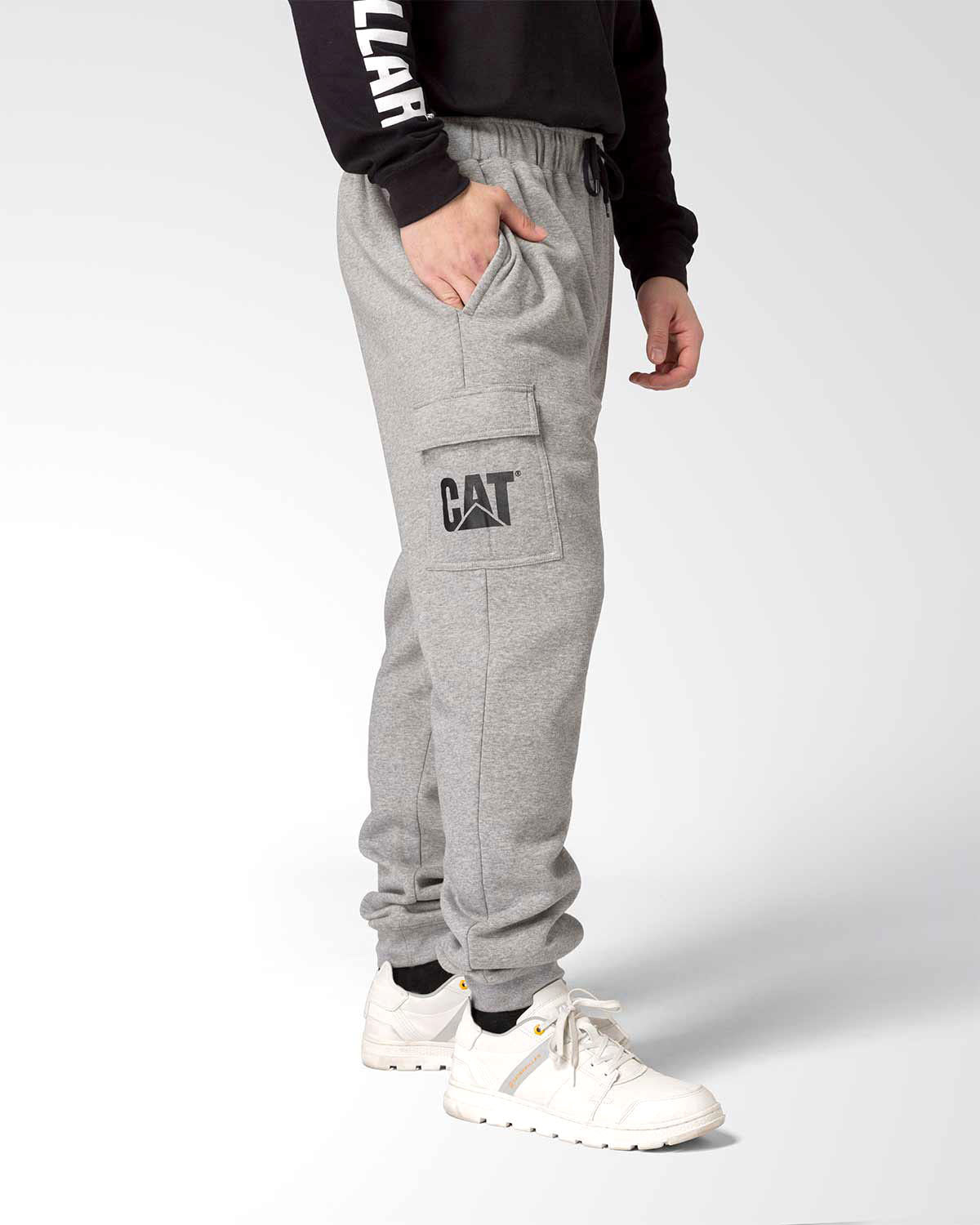 CAT Workwear Men's DM Logo Sweatpants Heather Grey on model right side, color:Heather Grey Blue