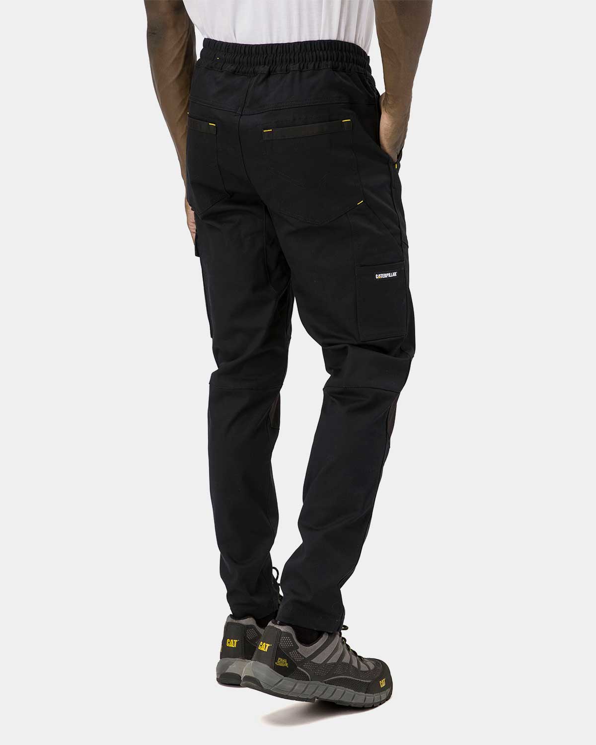 Cat Workwear Men's Dynamic Work Pant Black on model back, color:Black