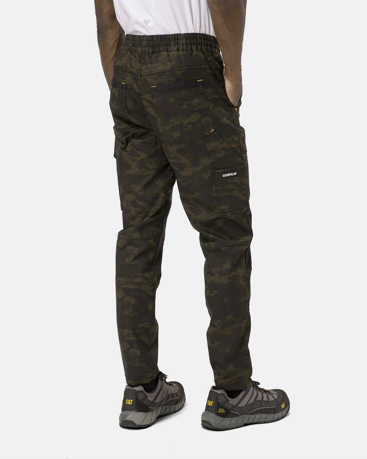 Cat Workwear Men's Dynamic Work Pant Night Camo on model back, color:Night Camo