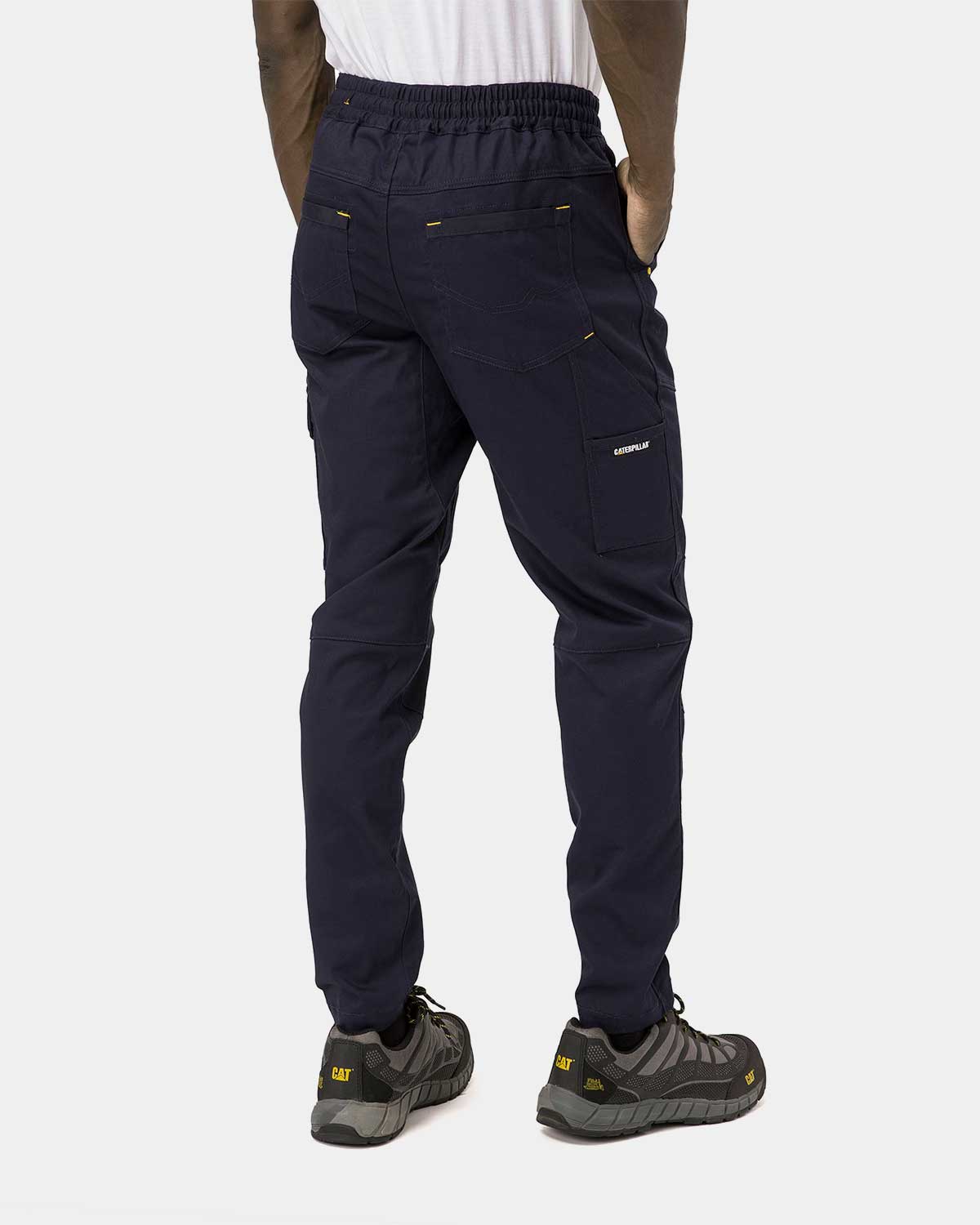 Cat Workwear Men's Dynamic Work Pant Navy on model back, color:Navy
