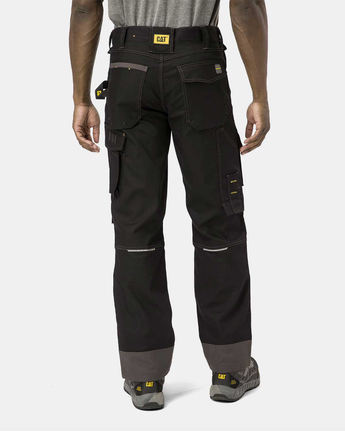 Cat Workwear Men's H2O Defender Work Pants Black on model back, color:Black