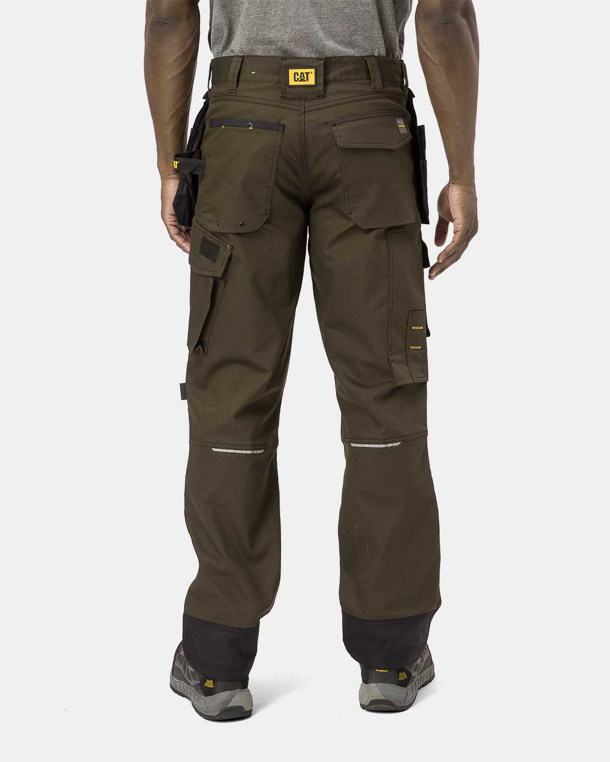 Cat Workwear Men's H2O Defender Work Pants Dark Earth on model back, color:Dark Earth