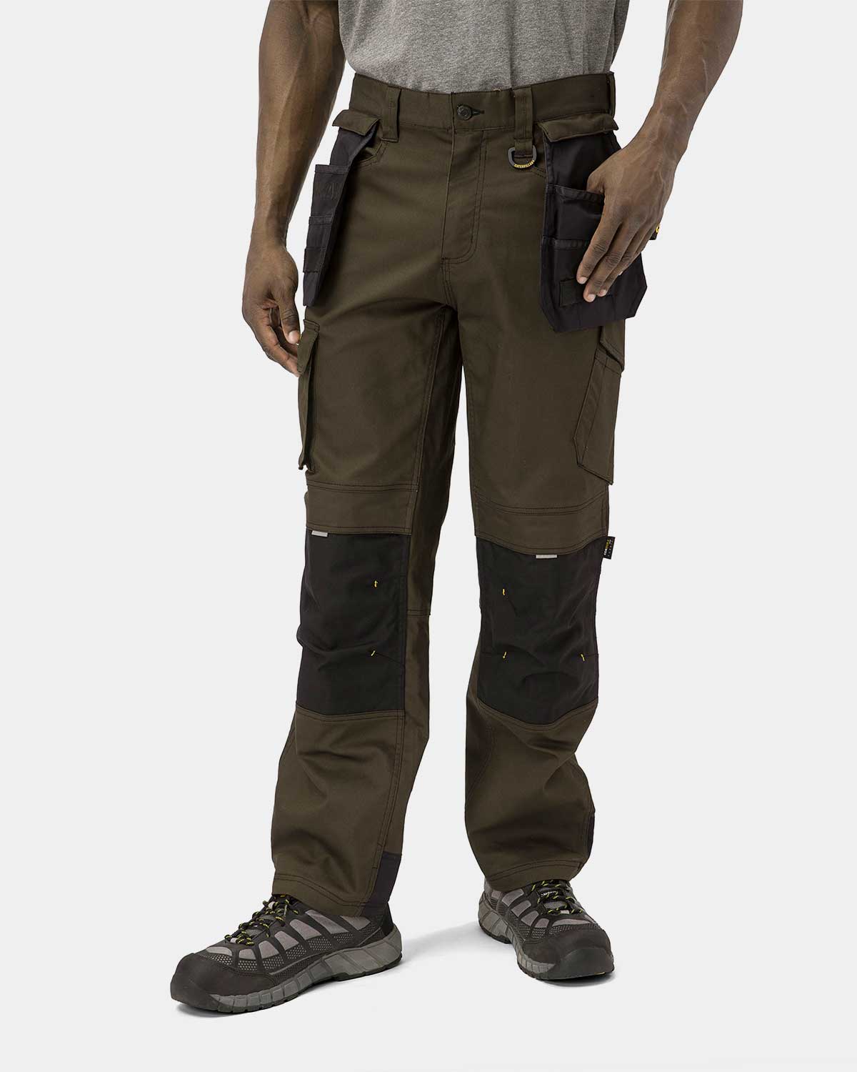 Cat Workwear Men's H2O Defender Work Pants Dark Earth on model Front with pockets pulled out, color:Dark Earth