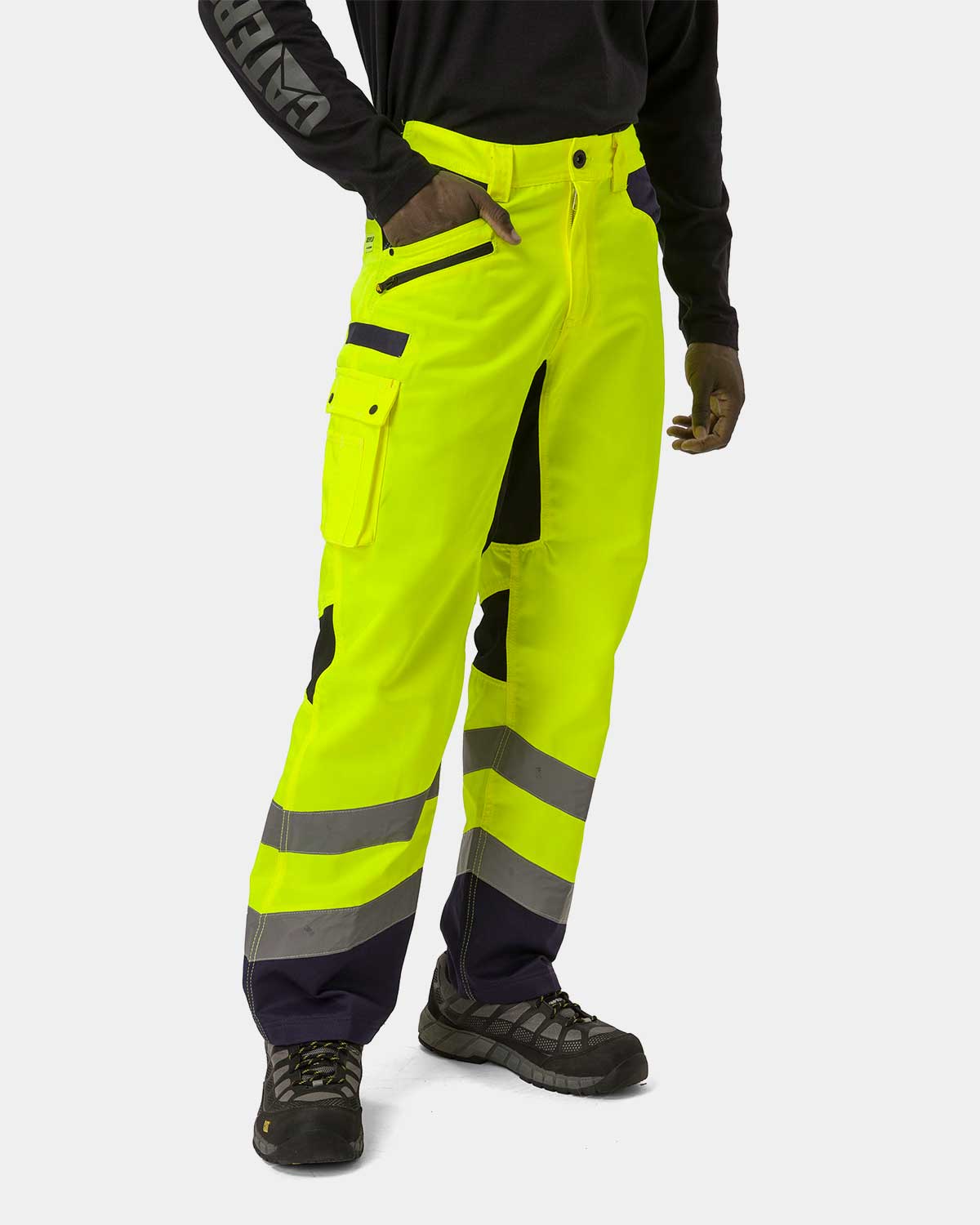 CAT workwear men's hi-vis operator flex work pants hi-vis yellow on model right side