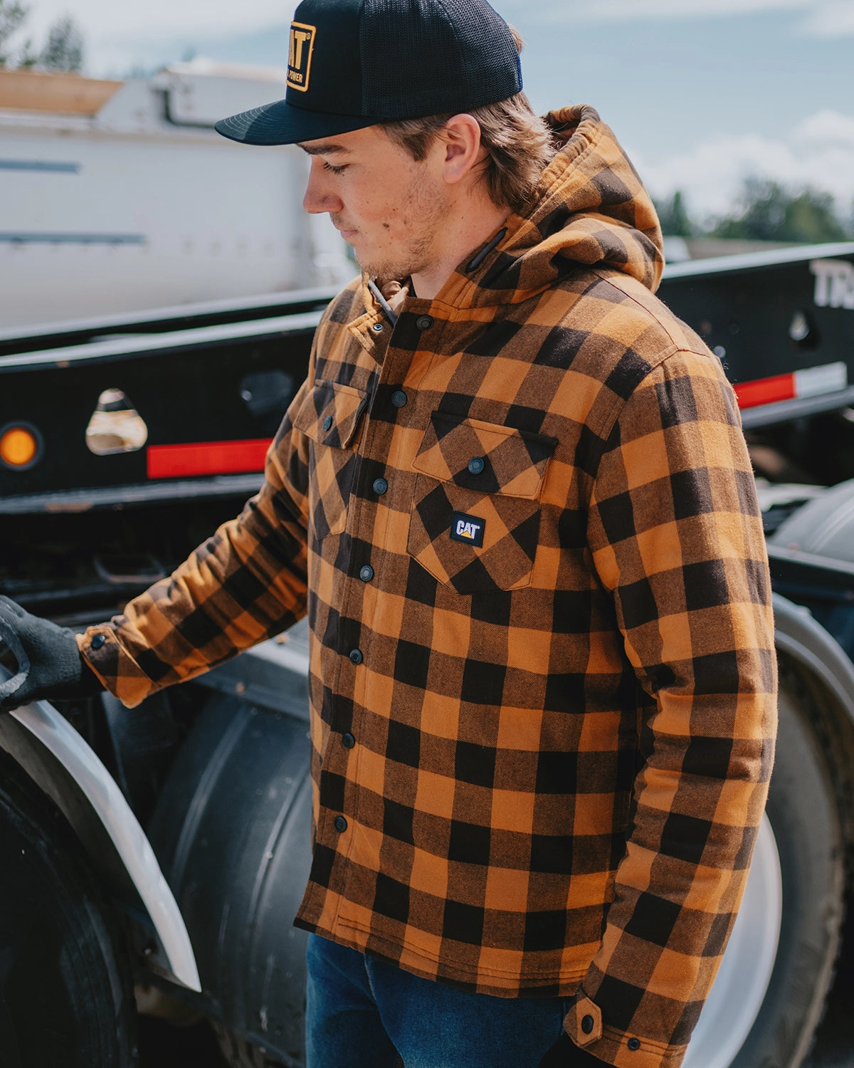 CAT workwear men's hooded flannel shirt jack bronze on model one