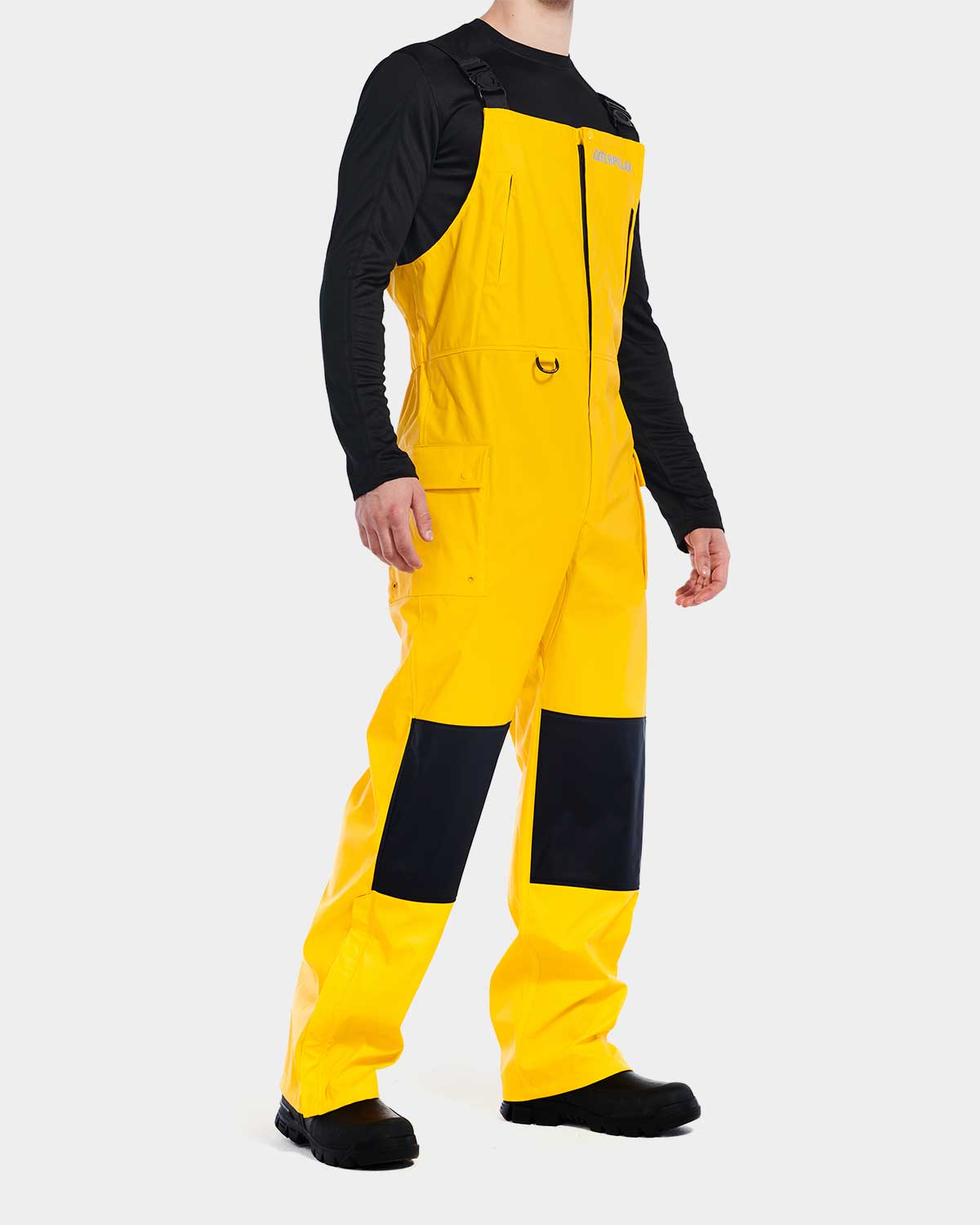 Cat Workwear Men's Longshore Waterproof Rain Bib Yellow on model three quarter turn right, color:Yellow