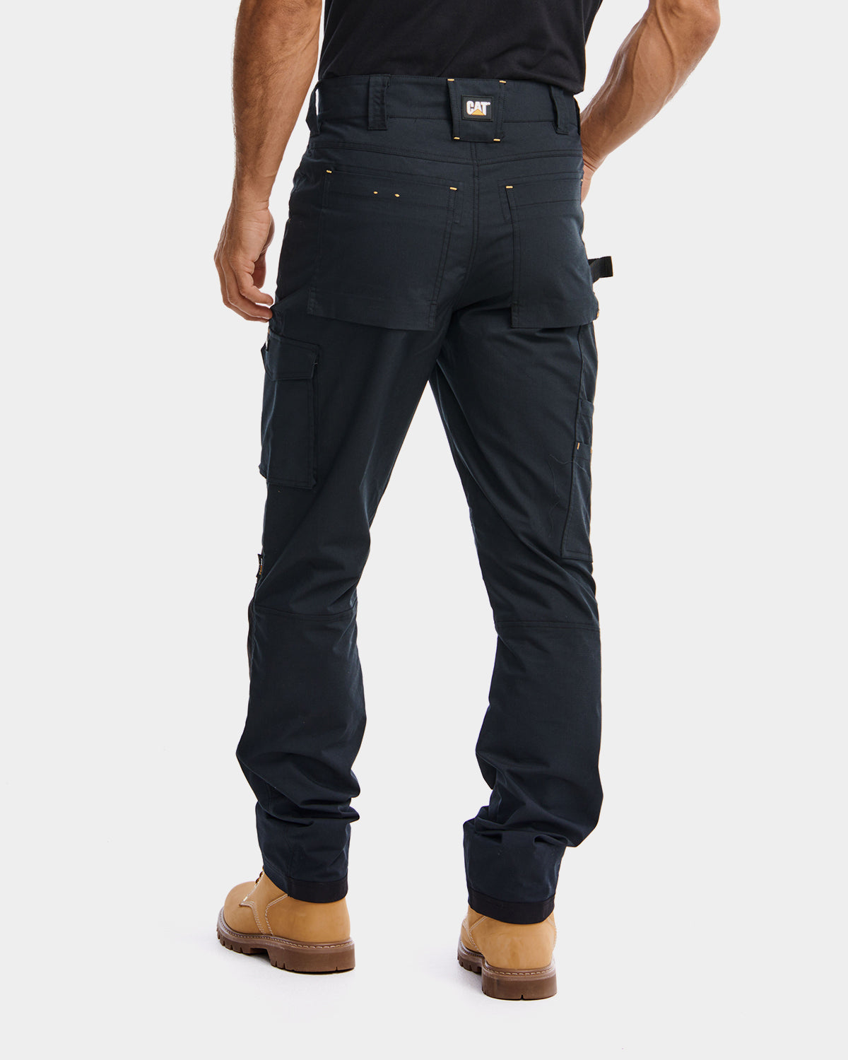 Cat workwear Men's Nexus Work Pant Black on model Back, color:Black