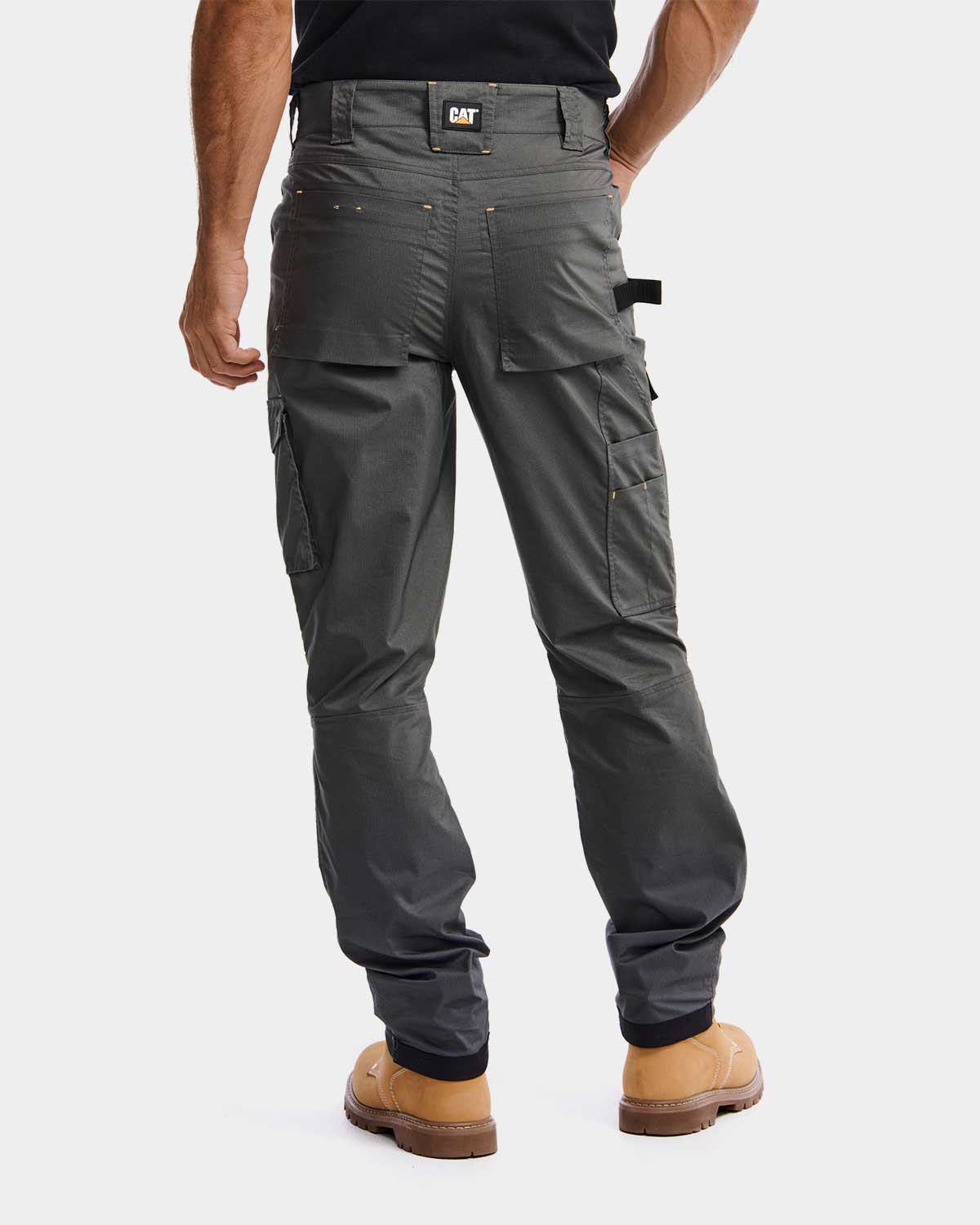 Cat workwear Men's Nexus Work Pant Dark Shadow on model back, color:Dark Shadow