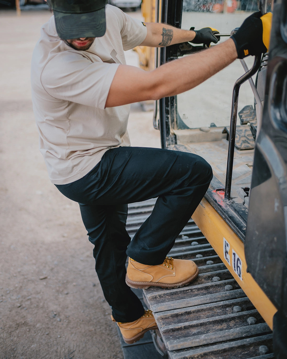 CAT workwear men's operator work pant black on model