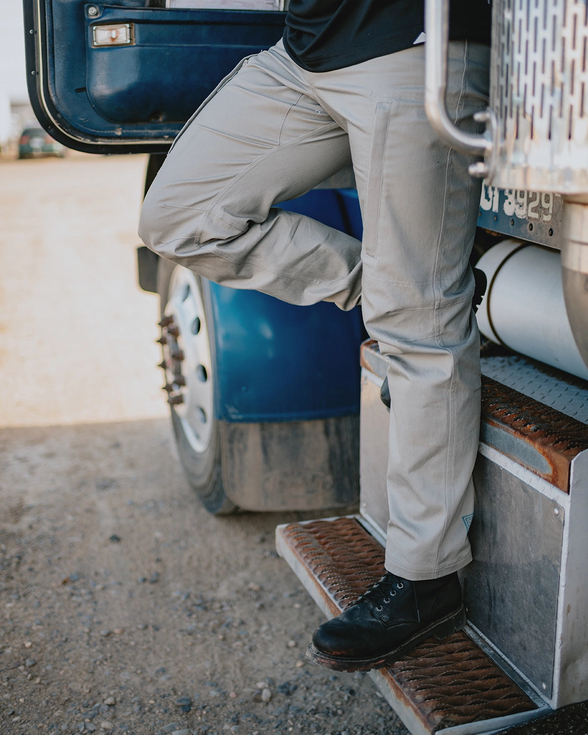CAT workwear men's operator work pant ghost grey on model