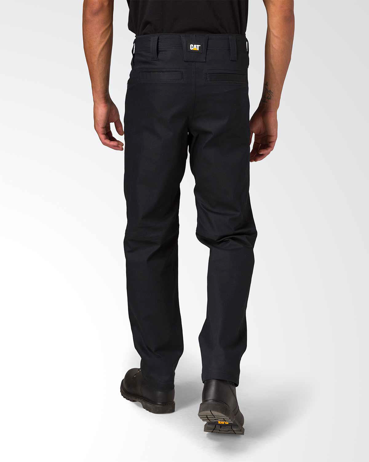 Cat workwear men's operator work pant black on model back, color: Black