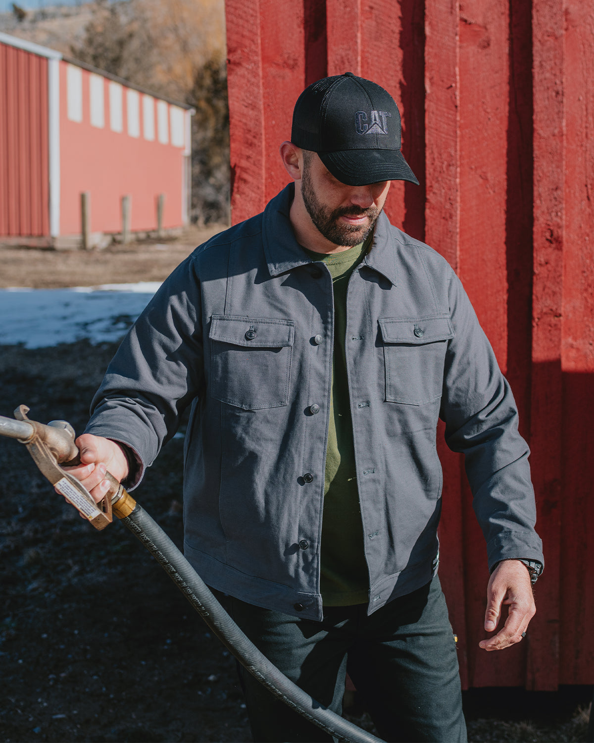 Cat Workwear MEN'S TRUCKER JACKET Field Filling The Tractor